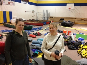 Teaching Assistant Betsy Young, ’03, works with Assistant Professor Amanda Booth to help inventory expedition gear, much of it provided by the University. Booth teaches the natural history section of Expedition Alaska.
