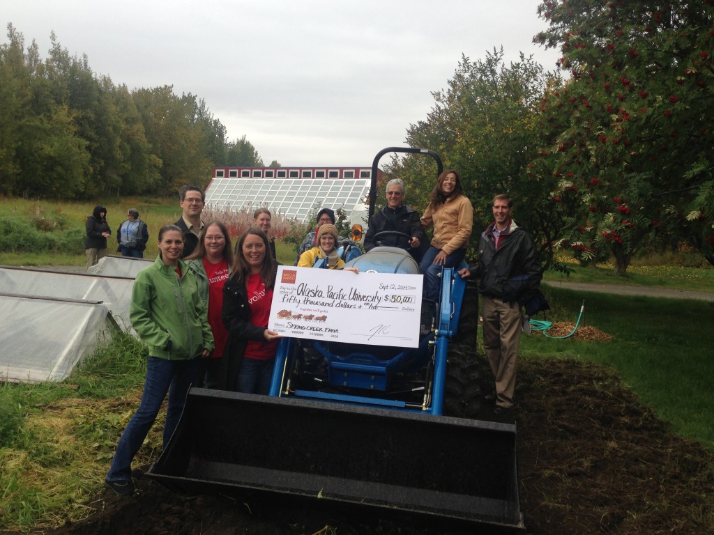  Wells Fargo presents Alaska Pacific University with a $50,000 check to support an APU farming and education project, "Growing Alaska’s Farmers."