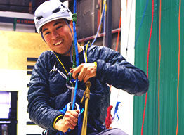 Student in climbing gear