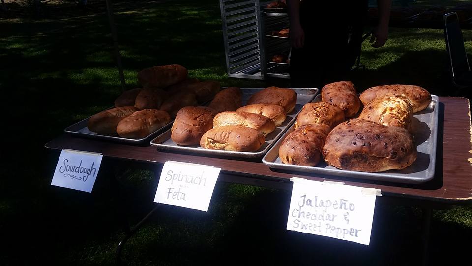 Different baked breads for sale at the Farmer's Market.