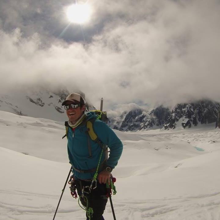 Sean Johnson hiking on a glacier.