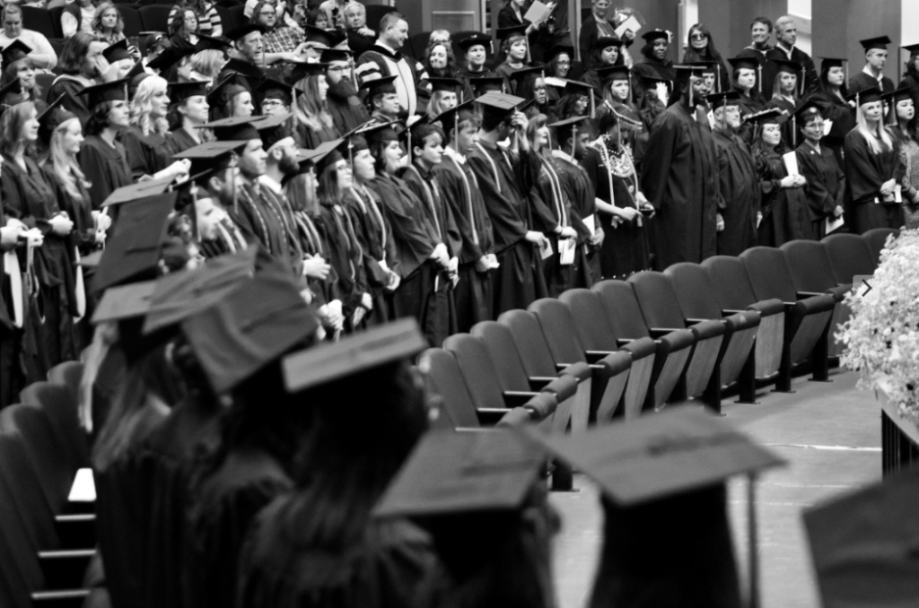Graduates waiting to receive thier diplomas during Spring 2017 APU Graduation Ceremony - black and white version