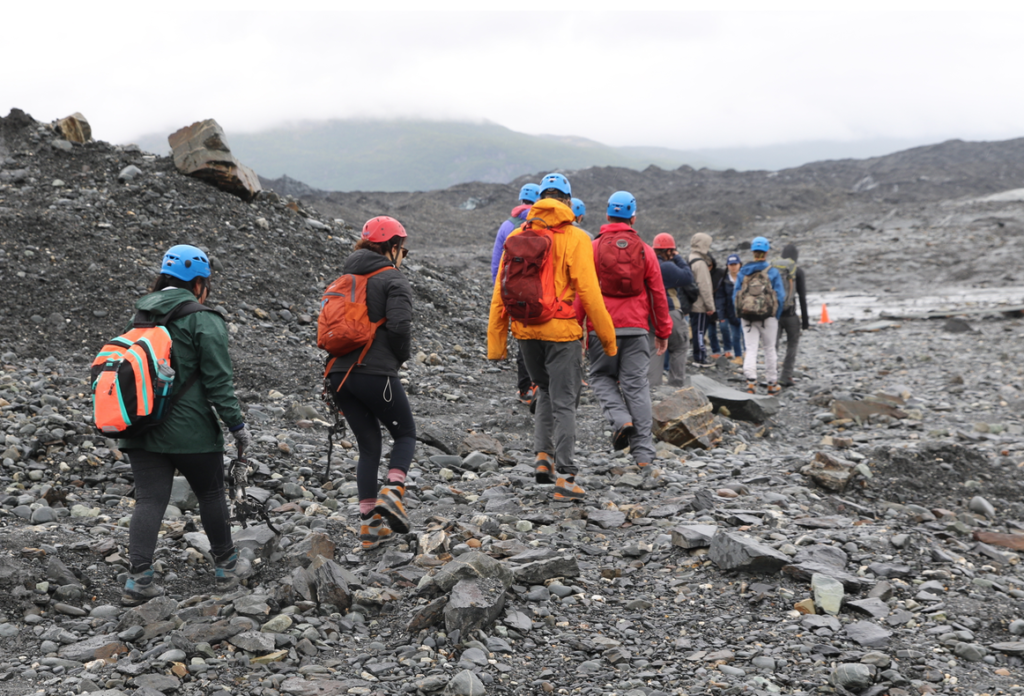 Students walking across glacial moraine.