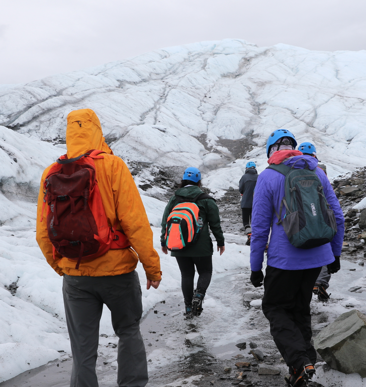 Group of 5 students trekking on the Matanuska Glacier