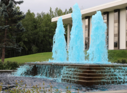 APU Atwood Building with fountain water dyed blue.