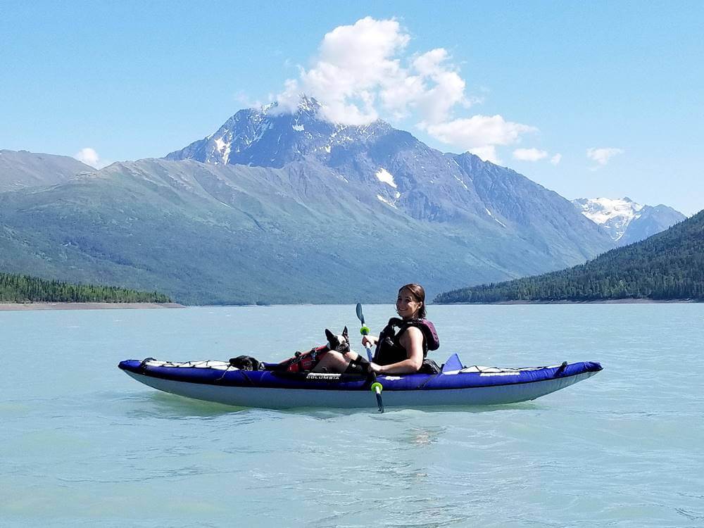 Mallory Wetherington in a Kayak with her Dog
