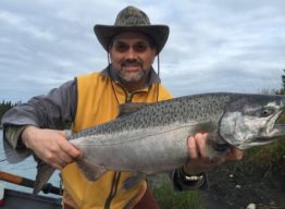 Mark Regoord holding salmon