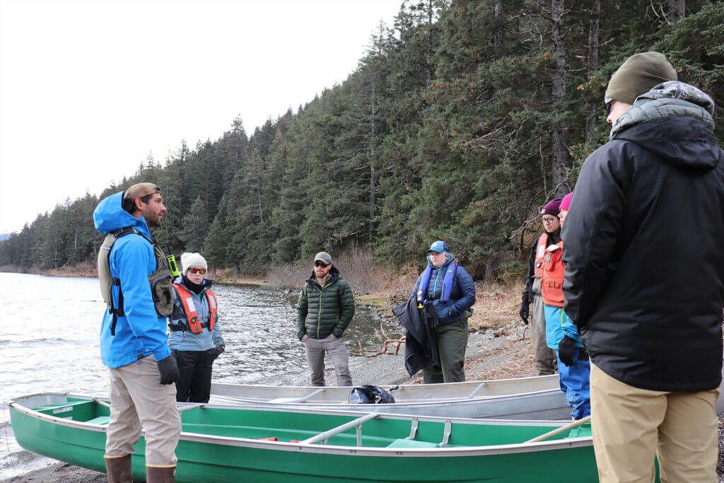 FAST Lab graduate students and instructors get ready to collect eDNA samples from the Nanwalek lake system.