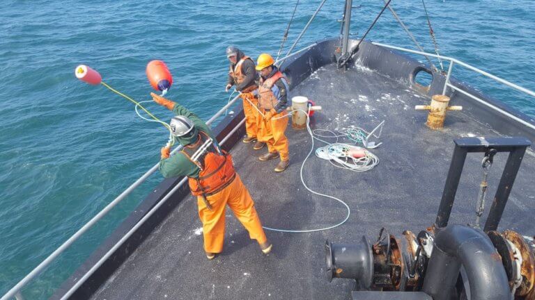 M/V Constellation crew deploying water temperature sensors south of Nunivak Island.