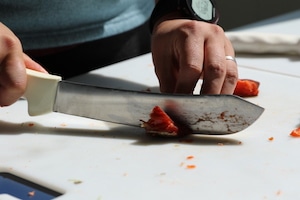 8G0A4077 Hands Filleting Salmon