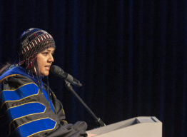 Speaker in commencement robes