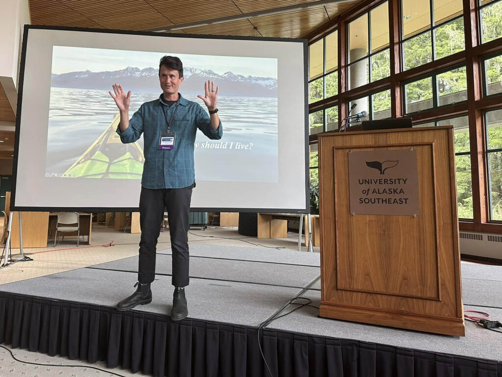 Dr. Buddy presenting at a conference