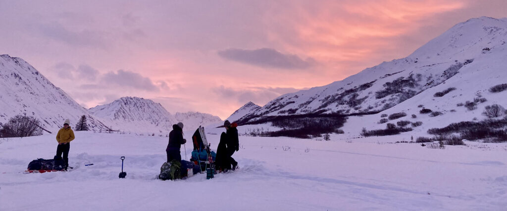 students camping in the winter
