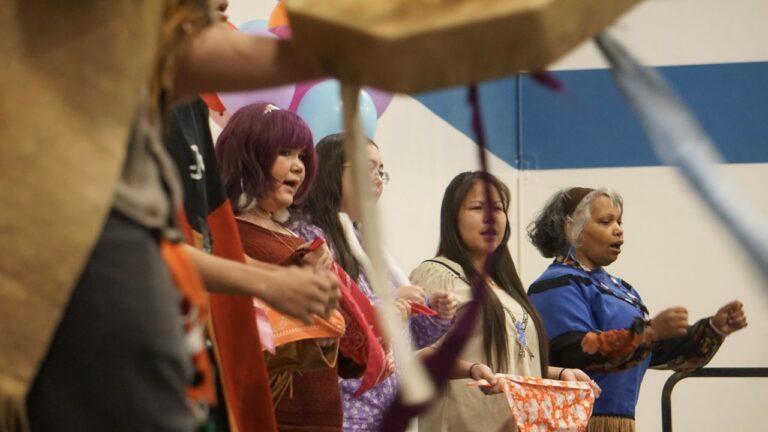 Members of the Ida'ina K'eljeshna dance group, also known as the Friendship Dancers, perform at the Indigenous Peoples Day celebration at Alaska Pacific University