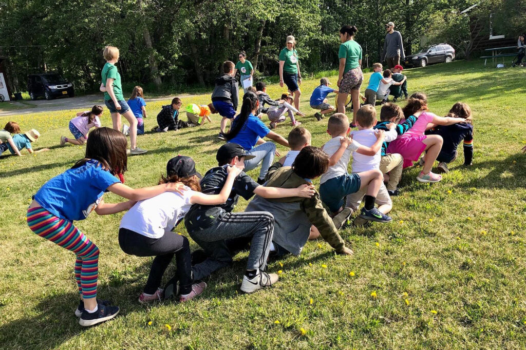 kids playing outside ruing camp Kellogg
